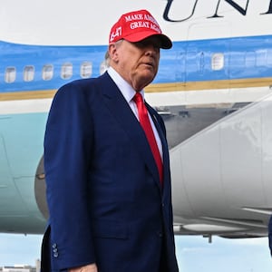 US President Donald Trump speaks to reporters after landing at the Palm Beach International Airport in West Palm Beach, Florida on February 16, 2025 after attending the Daytona 500 car race earlier in the day. US President Donald Trump said Sunday he could meet "very soon" with Vladimir Putin, adding he believes his Russian counterpart genuinely wants to stop fighting in Ukraine. (Photo by ROBERTO SCHMIDT / AFP via Getty Images)