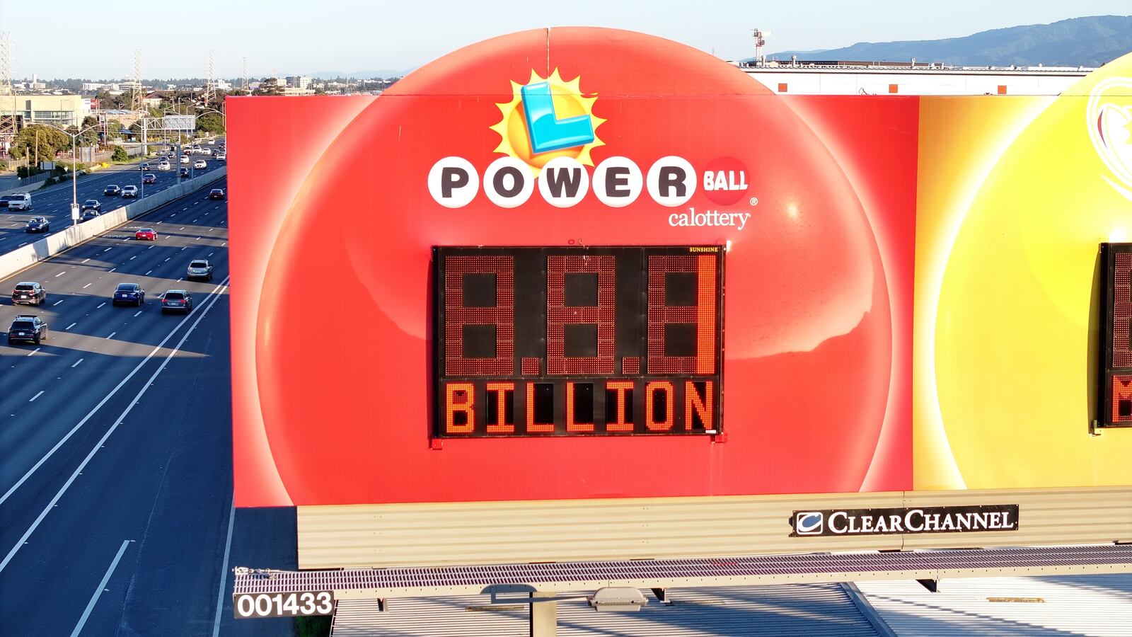 A giant lottery advertising sign is seen along Highway 101 as U.S. Powerball jackpot grows $1.1 billion, in Belmont of San Mateo County, California, United States on April 1, 2024.