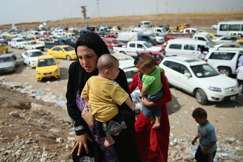 galleries/2014/06/16/thousands-flee-violence-in-iraq-photos/140616-iraq-refugees-5_jik7ly