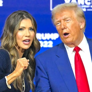 Donald Trump speaks with moderator Kristi Noem during a town hall at the Greater Philadelphia Expo Center and Fairgrounds in Oaks, Pennsylvania, on October 14, 2024.