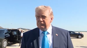 Donald Trump speaking to reporters.