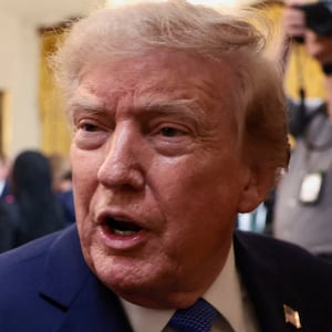 U.S. President Donald Trump points a finger as he leaves after a Team USA reception hosting athletes who competed for Team USA at the 2026 Winter Olympic and Paralympic Games in Milano Cortina, Italy, in the East Room at the White House in Washington, D.C., U.S., August 6, 2026. REUTERS/Evelyn Hockstein