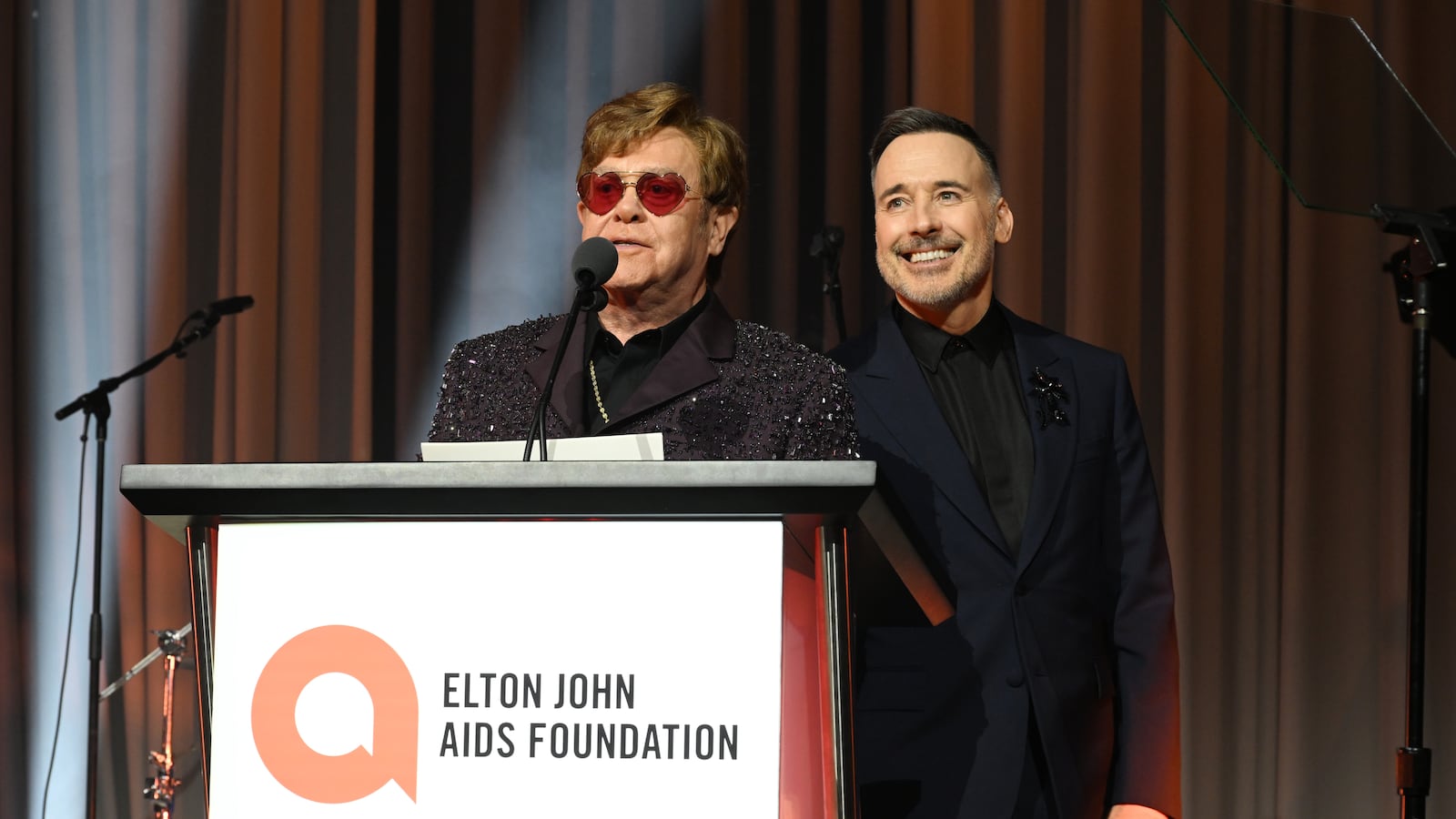 WEST HOLLYWOOD, CALIFORNIA - MARCH 12: (L-R) Elton John and David Furnish attend the Elton John AIDS Foundation's 31st Annual Academy Awards Viewing Party on March 12, 2023 in West Hollywood, California. (Photo by Michael Kovac/Getty Images for Elton John AIDS Foundation )