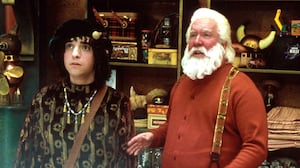 David Krumholtz, Tim Allen, Spencer Breslin stand next to each other in a still from ‘The Santa Clause 2’