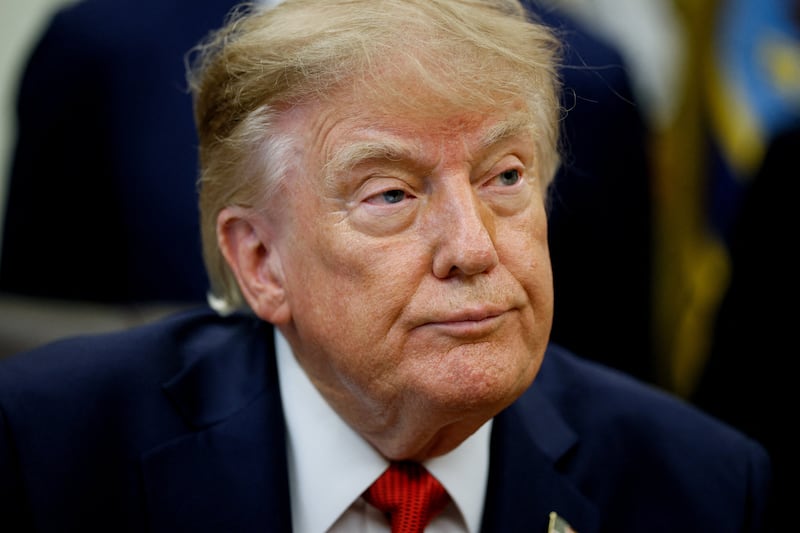 US President Donald J. Trump looks on as he makes an announcement on healthcare in the Oval Office at the White House in Washington, D.C., US, September 18, 2026. REUTERS/Evan Vucci