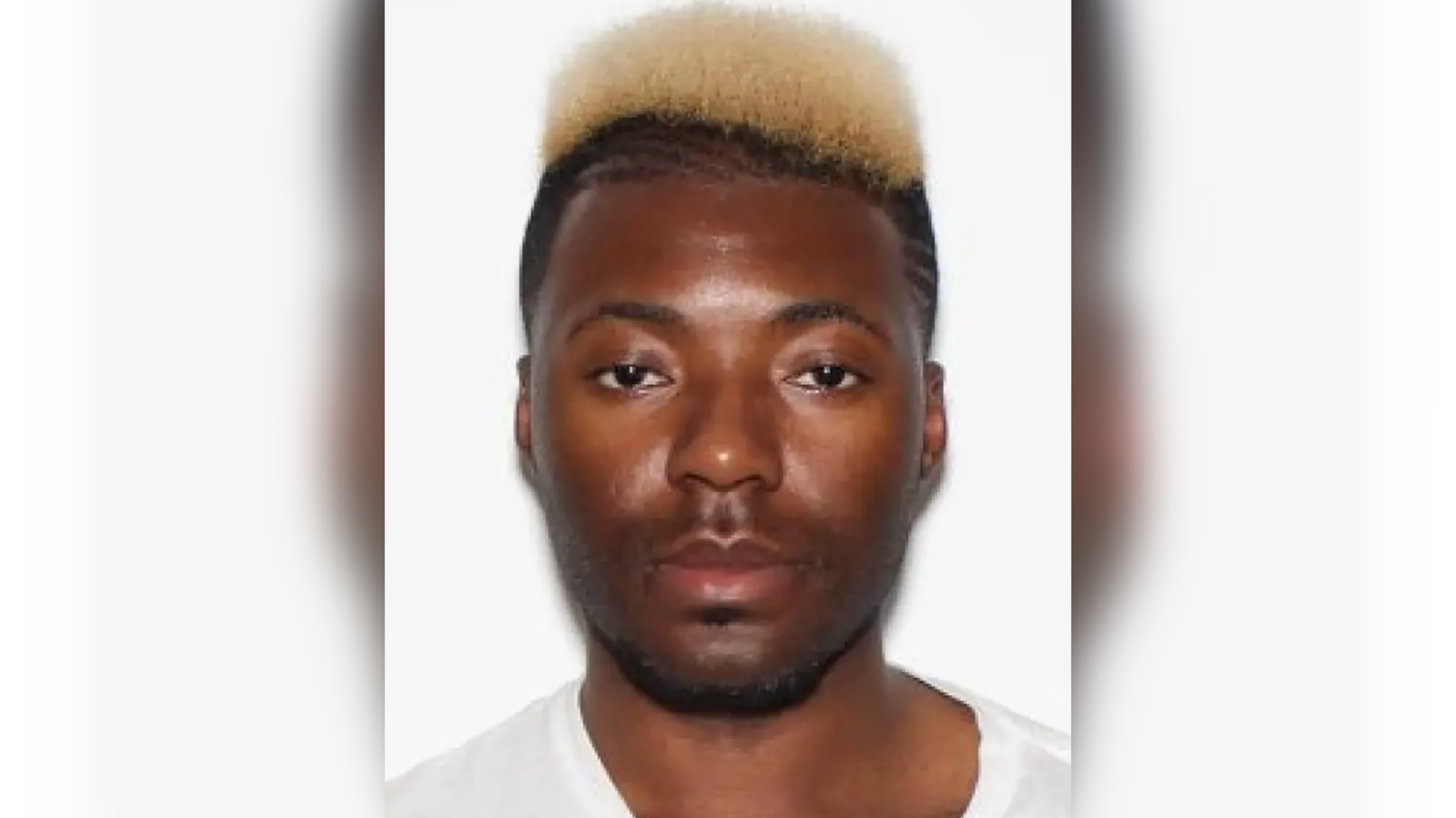 Billy Ortega stares forward in a DMV photo.