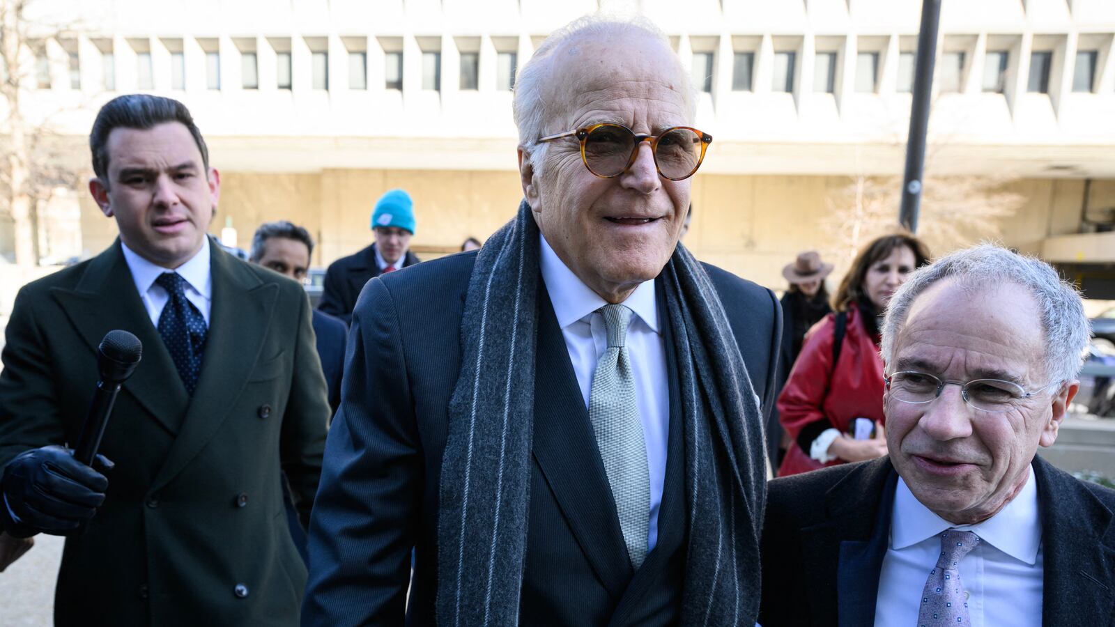 James Biden (C), brother of US President Joe Biden, and his attorney Paul Fishman (R) arrive for a deposition before the House Oversight and Judiciary Committees on President Biden's impeachment inquiry in Washington, DC, February 21, 2024