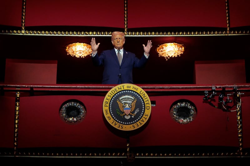 resident Donald Trump looks down from the Presidential Box in the Opera House at the John F. Kennedy Center for the Performing Arts 2025