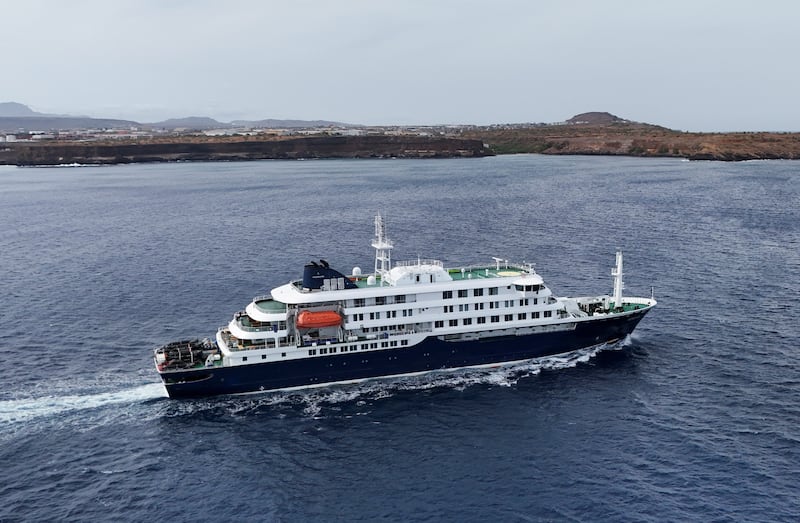 A drone view of the cruise ship MV Hondius, carrying passengers suspected of having cases of hantavirus on board, leaves Praia, Cape Verde, May 6, 2026.