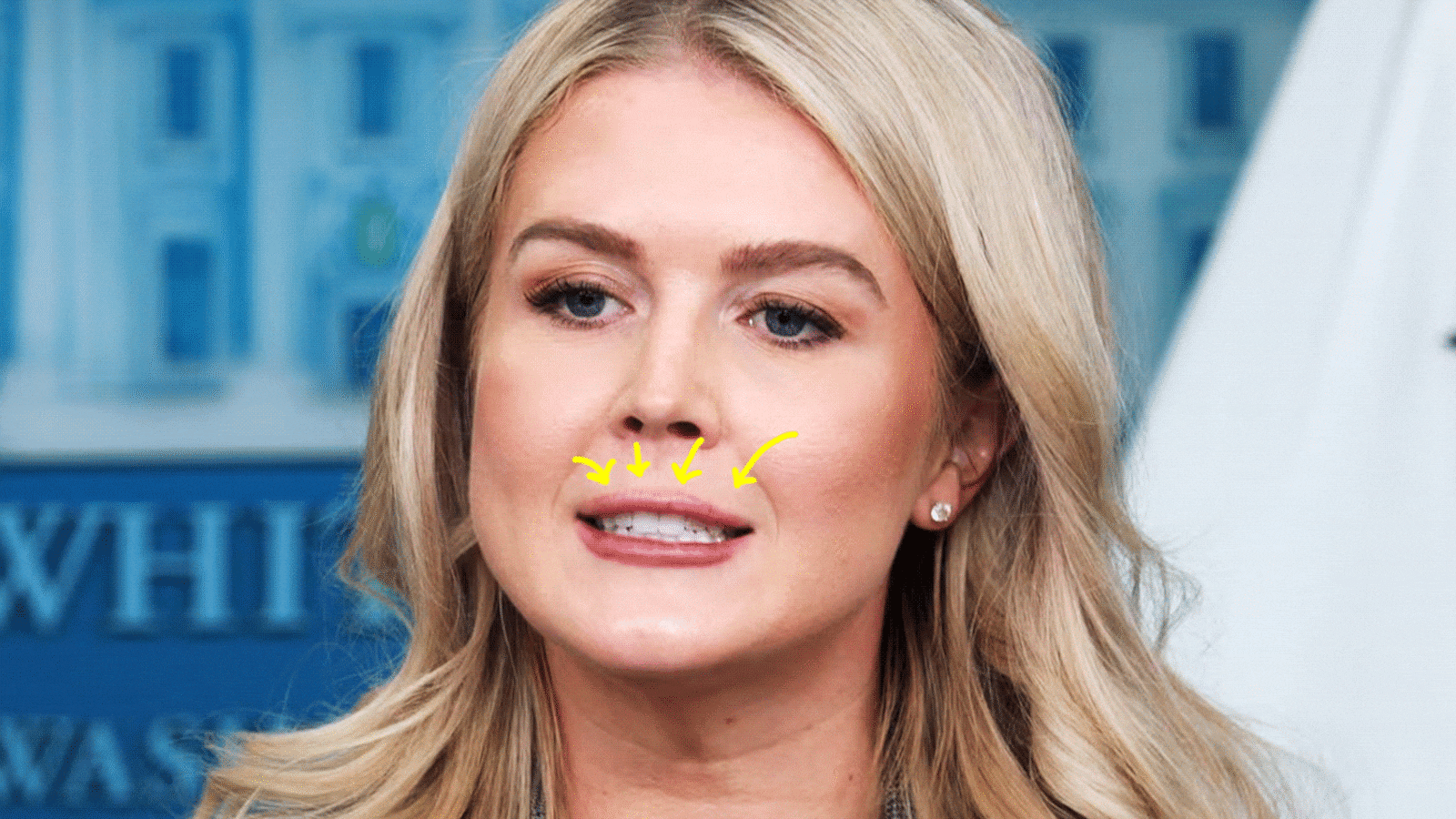 Karoline Leavitt with arrows pointing to her lips