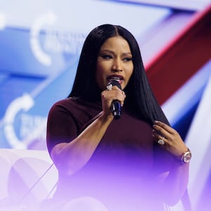 PHOENIX, ARIZONA - DECEMBER 21: Erika Kirk interviews surprise guest Nicki Minaj on the final day of Turning Point USA's annual AmericaFest conference at the Phoenix Convention Center on December 21, 2025 in Phoenix, Arizona. Minaj spoke about her frustrations with California Governor Gavin Newsom, and about why she has embraced the conservative movement. (Photo by Caylo Seals/Getty Images)
