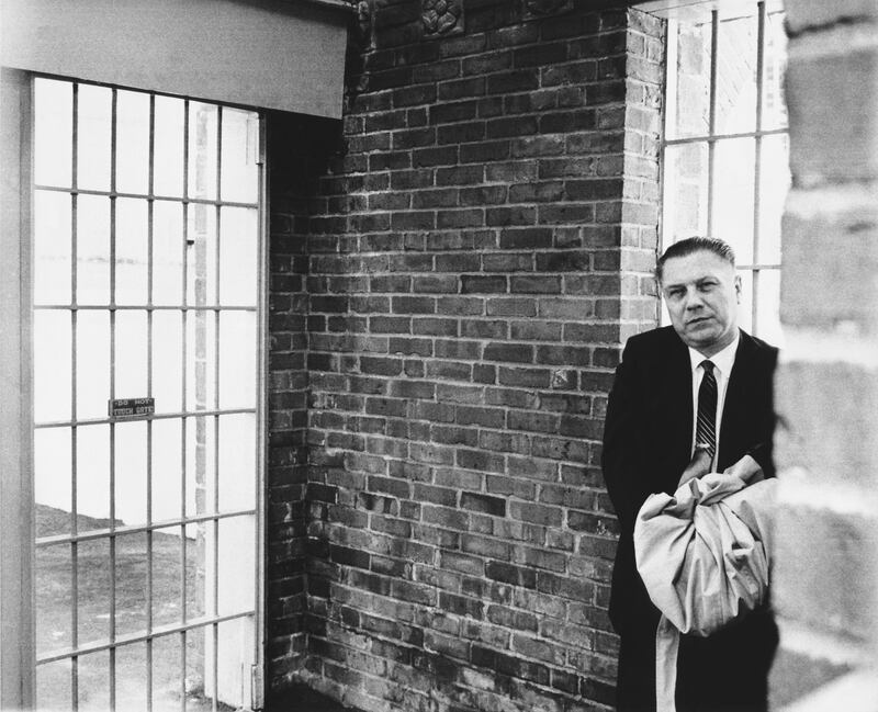 Handcuffed Teamster leader Jimmy Hoffa as he waits for the next door to open at Lewisburg Federal Prison where he will serve his eight year sentence, Lewisburg, Pennsylvania, December 9, 1967. (Photo by Underwood Archives/Getty Images)