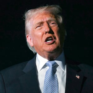US President Donald Trump speaks with reporters before boarding Air Force One as he departs Palm Beach International Airport in West Palm Beach, Florida, on November 16, 2025.