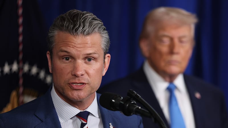 PALM BEACH, FLORIDA - JANUARY 03: U.S. Secretary of War Pete Hegseth speaks during a press conference with U.S. President Donald Trump at Mar-a-Lago club on January 03, 2026, in Palm Beach, Florida. During the event, President Trump confirmed that the U.S. military carried out a large-scale strike in Caracas overnight, resulting in the capture of Venezuelan leader Nicolas Maduro and his wife, Cilia Flores.  (Photo by Joe Raedle/Getty Images)