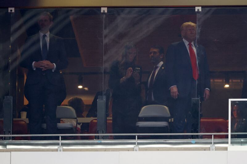 Eric Trump attending Charlie Kirk's memorial with his father on Sunday.