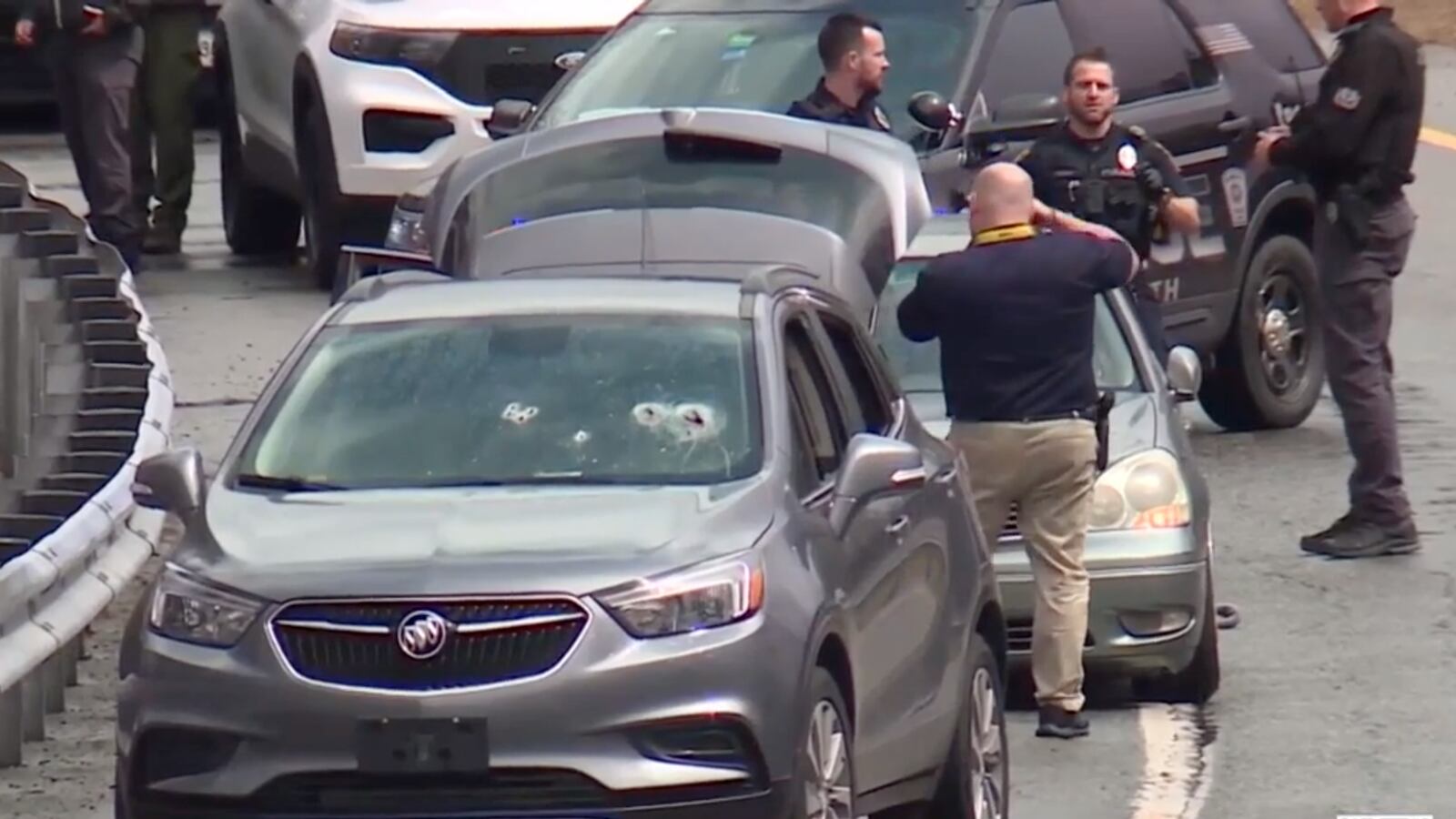 Law enforcement at the scene of a shooting on I-295 in Maine.