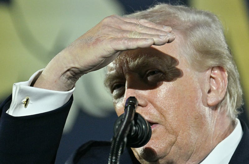 US President Donald Trump gestures as he speaks during the National Republican Congressional Committee's annual President's Dinner at Union Station in Washington, DC on March 25, 2026. (Photo by Jim WATSON / AFP via Getty Images)