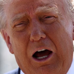 U..S. President Donald Trump speaks at the site of ongoing construction of the planned White House ballroom in Washington, D.C., U.S., May 19, 2026. REUTERS/Kevin Lamarque