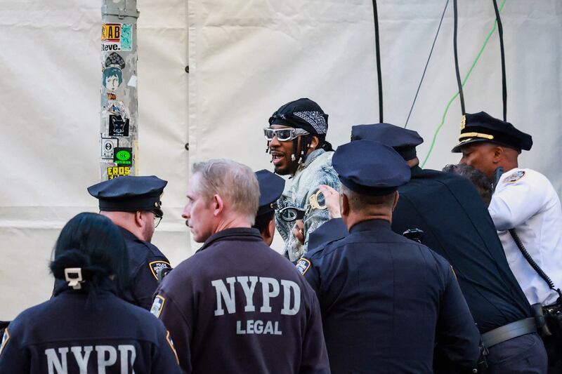 Chris Smalls is detained after trying to enter the venue with a protest sign during the Met Gala, an annual fundraising gala held for the benefit of the Metropolitan Museum of Art's Costume Institute with this year's theme 'Costume Art' in New York City, New York, U.S., May 4, 2026.