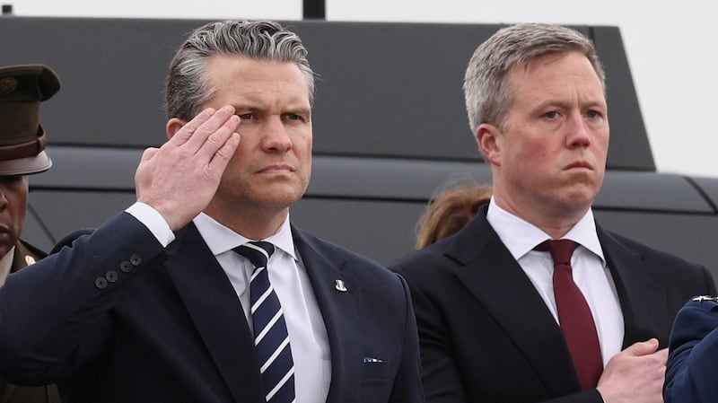 Pete Hegseth and  Army Secretary Daniel Driscoll, pay their respects during a dignified transfer of the remains of six U.S. Army service members of the 103rd Sustainment Command, who were killed during the war in Iran, at Dover Air Force Base in Dover, Delaware, U.S., March 7, 2026.