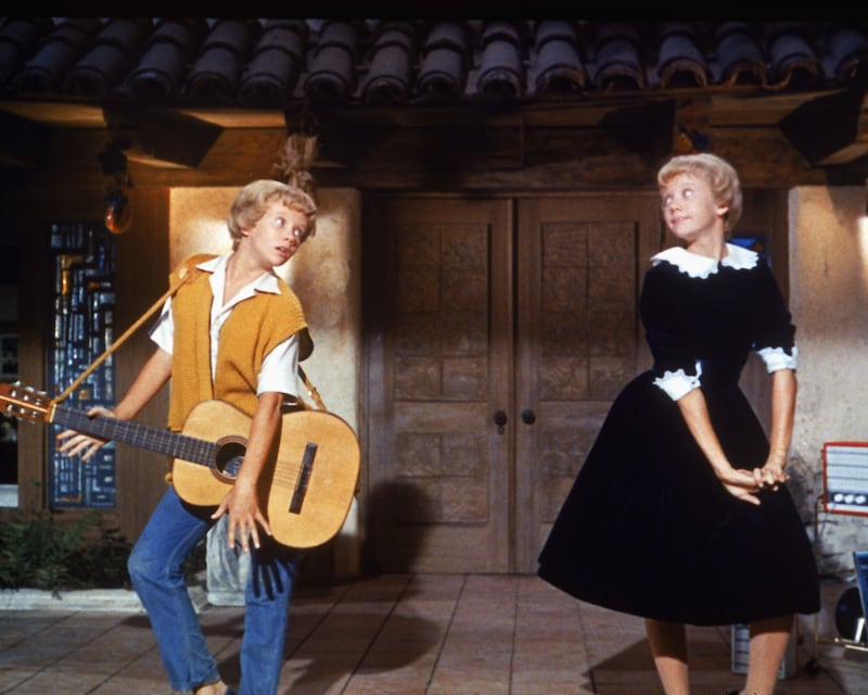 English actress Hayley Mills as identical twins Sharon McKendrick and Susan Evers in the Walt Disney comedy 'The Parent Trap', 1961.