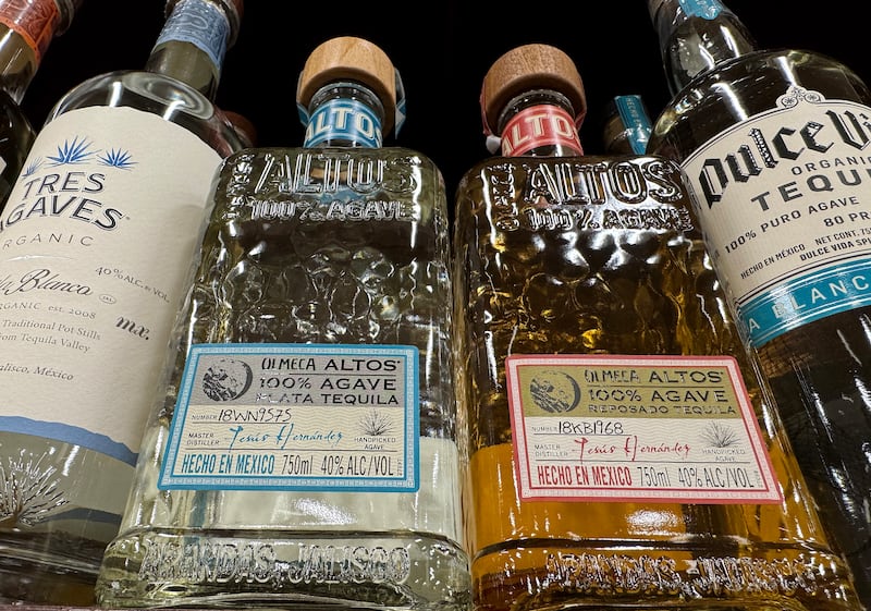 SAN ANSELMO, CALIFORNIA - MARCH 03: Bottles of tequila from Mexico are displayed on a shelf at a Safeway store on March 03, 2025 in San Anselmo, California. US Commerce Secretary Howard Lutnick said tariffs against Mexico and Canada will begin on March 4th and could be as high as 25 percent. (Photo Illustration by Justin Sullivan/Getty Images)