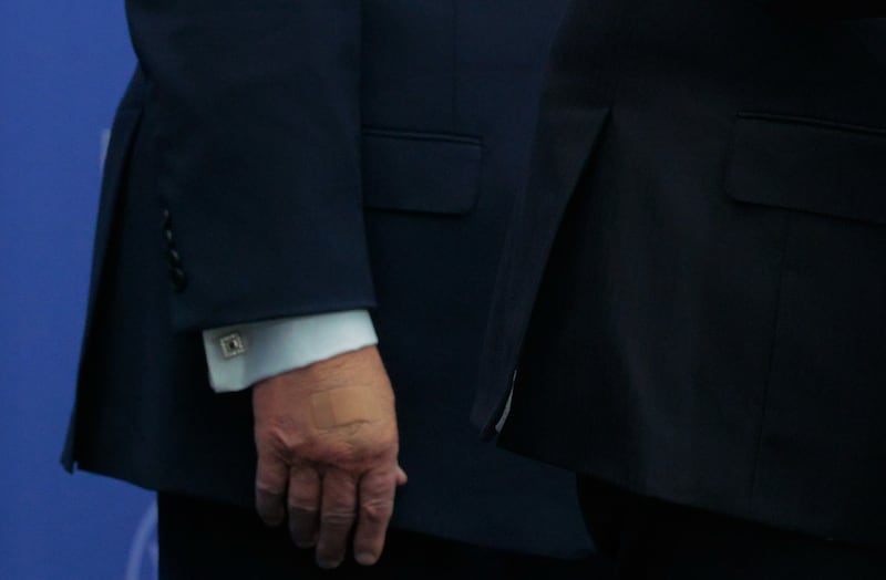 Close up look at the Band-Aid on Donald Trump's hand.
