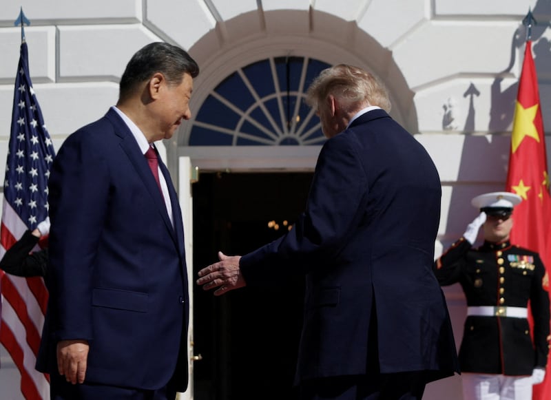 US President Donald Trump ignored questions and ushered Chinese President Xi Jinping into the White House in Washington, DC, US, September 25, 2026. REUTERS/Evan Vucci