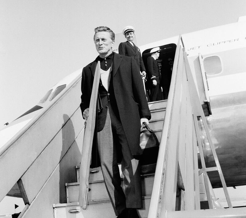 galleries/2013/08/10/classic-jet-set-jackie-o-liz-tayor-more-stars-in-the-air-photos/classic-jet-set-kirk-douglas_kbfkgy