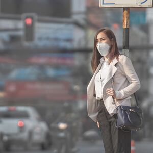 Woman going to work wearing N95 mask.