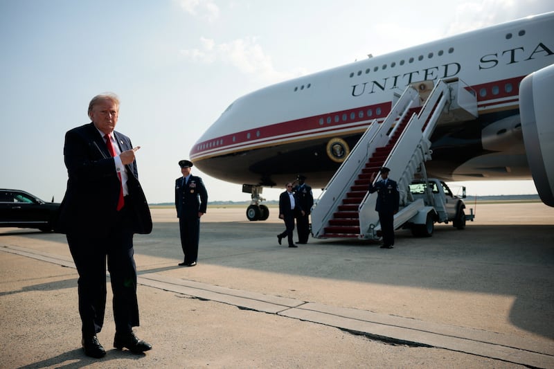 U.S. President Donald Trump points at the new Air Force One, a plane gifted by the Qatari government, before boarding the plane, at Joint Base Andrews, Maryland, U.S., July 1, 2026. REUTERS/Evan Vucci