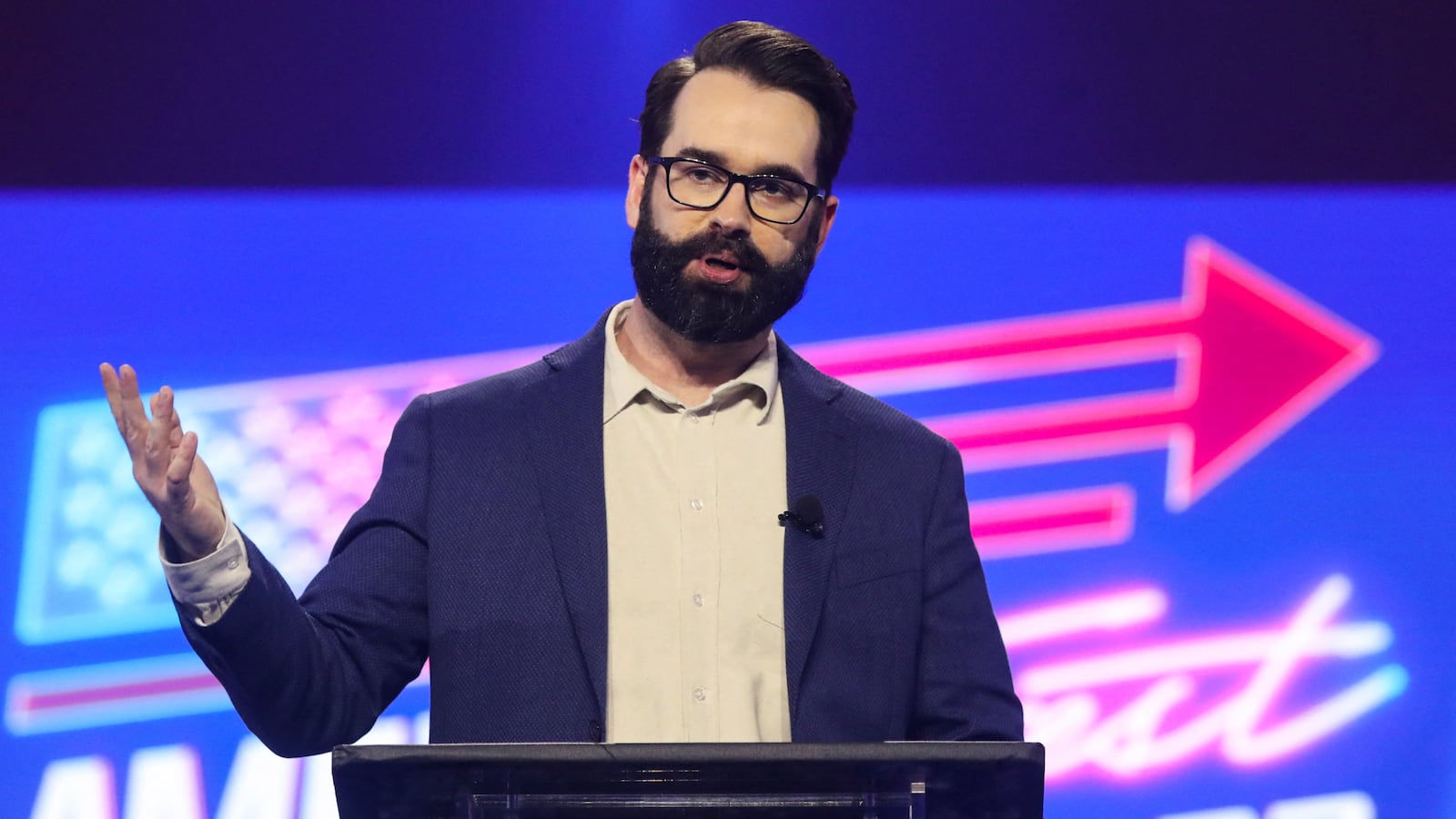Matt Walsh speaks during a right-wing gathering known as America Fest