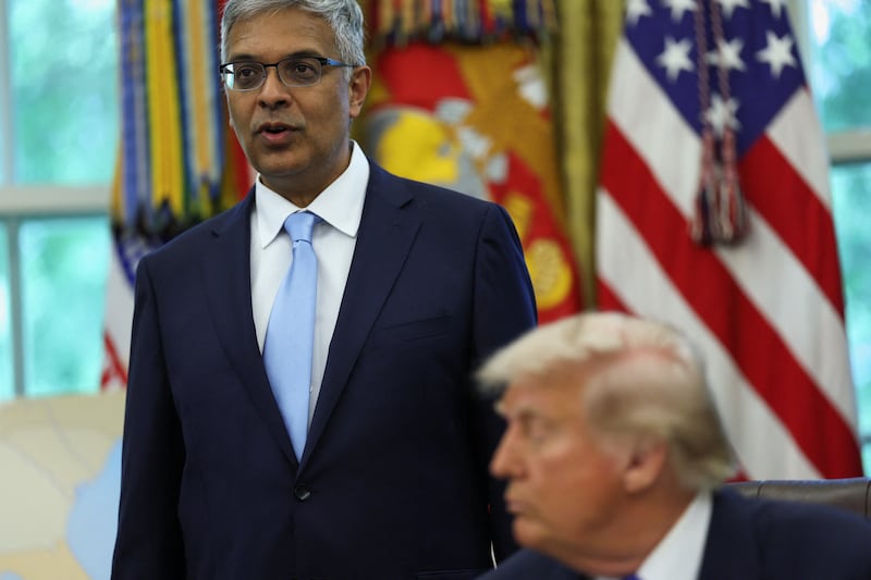 Director of the National Institutes of Health Jay Bhattacharya speaks as U.S. President Donald Trump signs executive orders and proclamations in the Oval Office at the White House, in Washington, D.C., U.S., May 5, 2025. REUTERS/Leah Millis