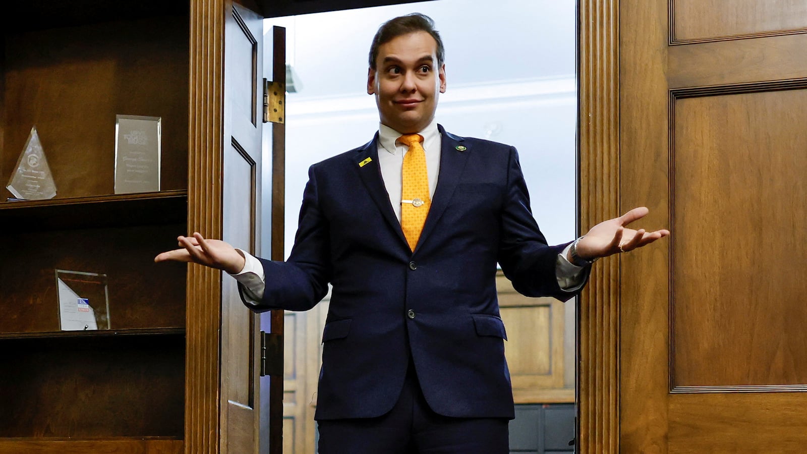 George Santos (R-NY) chats with his State of the Union guest and members of his staff as they prepare for the evening in Santos’s office on Capitol Hill in Washington, D.C., Feb. 7, 2023