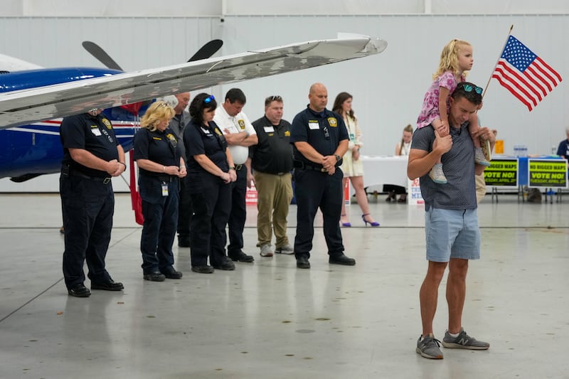 Supporters pray during a campaign rally against Virginia Democrats' proposed state redistricting constitutional amendment ahead of the referendum special election on April 21, in Bridgewater, Virginia, April 11, 2026. REUTERS/Ken Cedeno