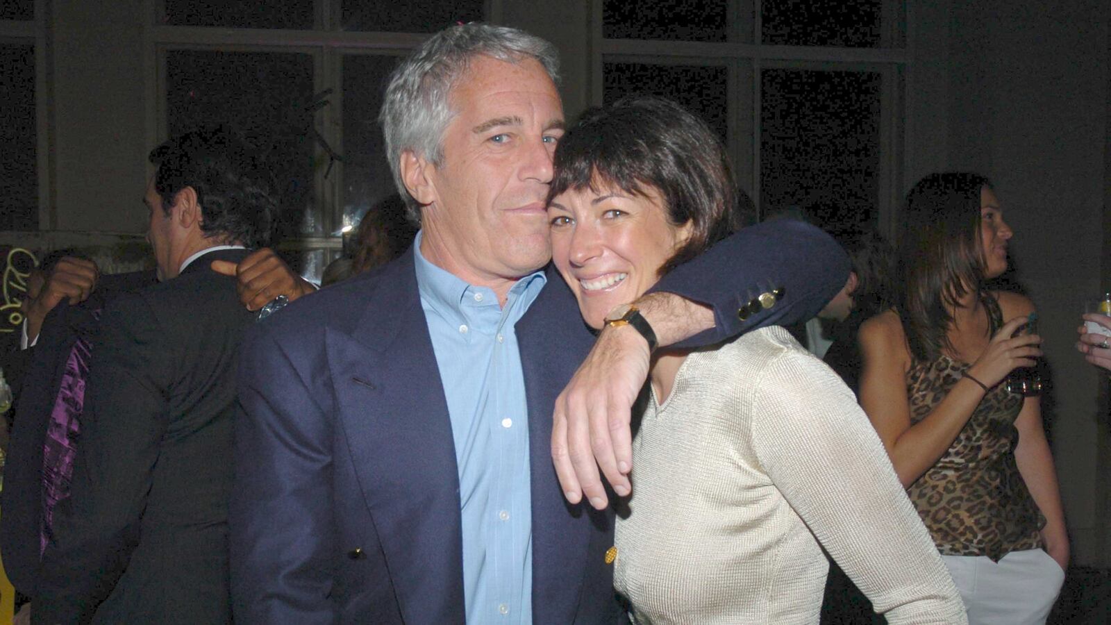 Jeffrey Epstein puts his arm around Ghislaine Maxwell during an event in New York in 2005.