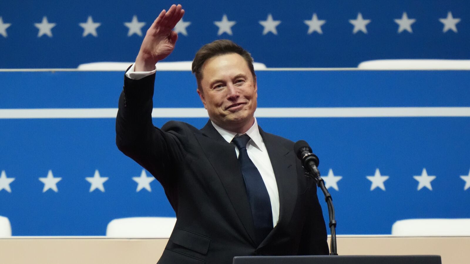 WASHINGTON, DC - JANUARY 20: Tesla, SpaceX and X CEO Elon Musk gestures while speaking during an inauguration event at Capital One Arena on January 20, 2025 in Washington, DC. Donald Trump takes office for his second term as the 47th president of the United States. (Photo by Christopher Furlong/Getty Images)
