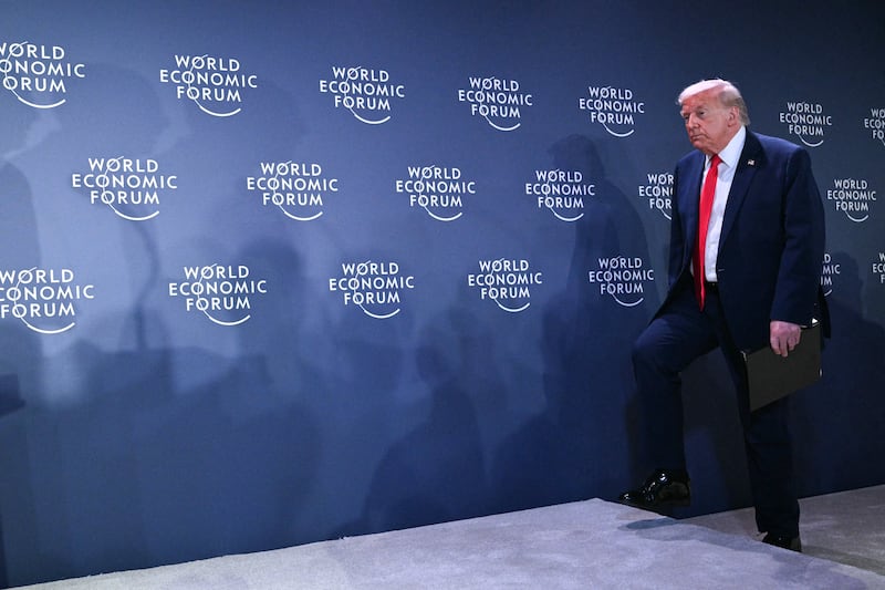 President Donald Trump arrives for a reception with business leaders on the sidelines of the World Economic Forum (WEF) annual meeting in Davos on January 21, 2026.