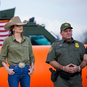 U.S. Secretary of Homeland Security Kristi Noem stands alongside U.S. Border Patrol Rio Grande Valley Sector Chief Jared Ashby, left, and U.S. Border Patrol Chief Mike Banks