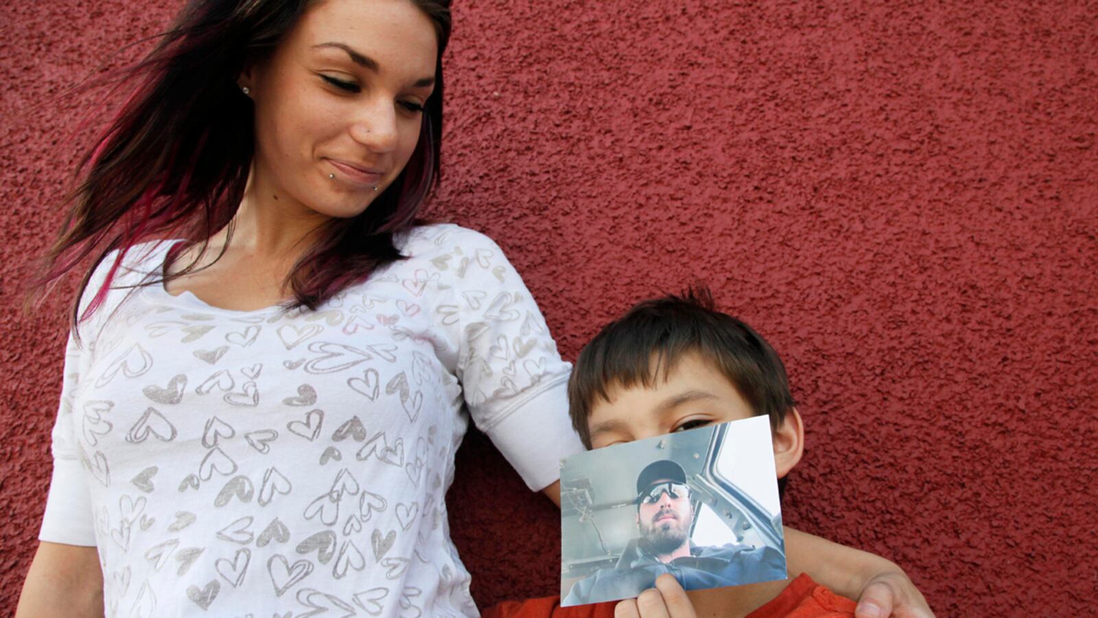 articles/2011/09/09/ptsd-at-joint-base-lewis-mcchord-suicides-murders-and-soldiers-waterboarding-their-kids/army-ranger-suicide-ross_hofnj9