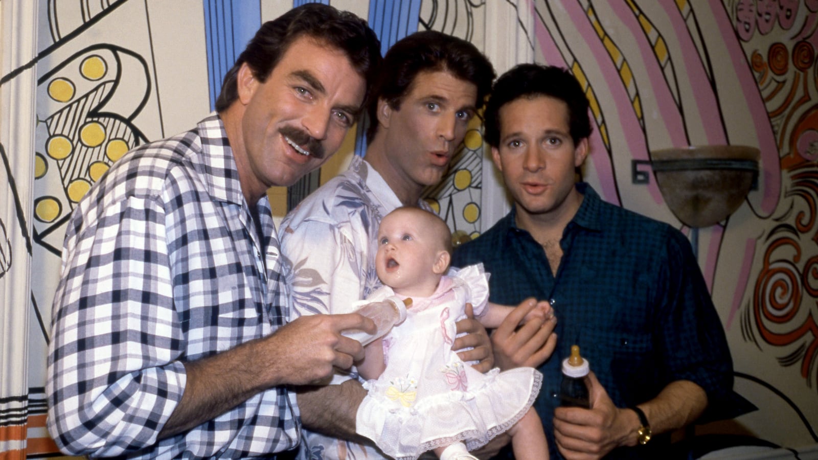 Tom Selleck, Ted Danson, and Steve Guttenberg in Three Men and a Baby.
