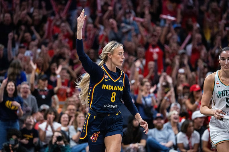 Jul 18, 2026; Indianapolis, Indiana, USA; Indiana Fever guard Sophie Cunningham (8) celebrates a made basket in the second half against the New York Liberty at Gainbridge Fieldhouse. Mandatory Credit: Trevor Ruszkowski-Imagn Images