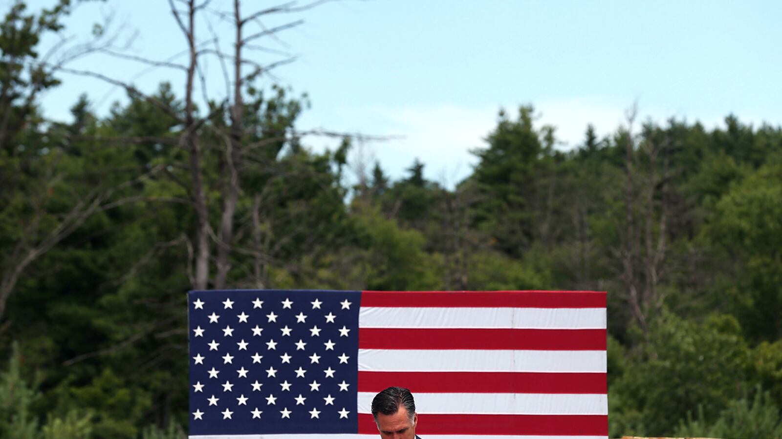 articles/2012/07/22/endorse-gun-control-mitt/aurora-shooting-romney-mckinnon_o0rq3m