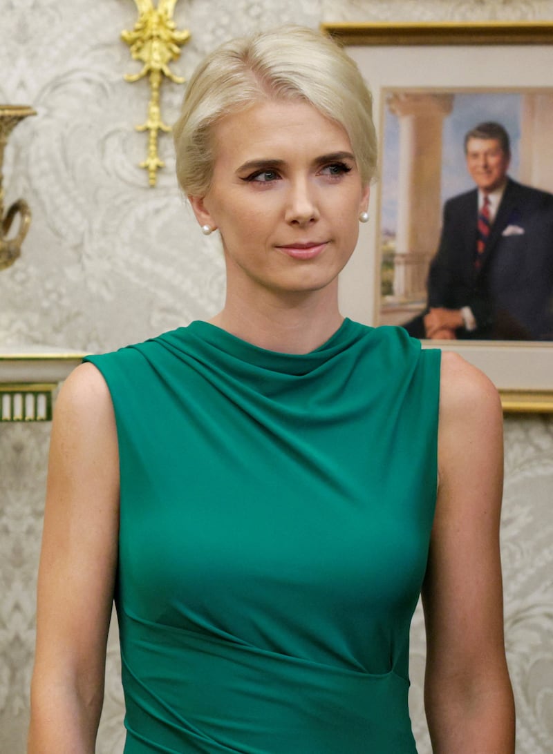 U.S. President Donald Trump's executive assistant Natalie Harp attends an event held by Trump to sign an executive order renaming Lake Ontario as Lake America at the Oval Office of the White House in Washington, D.C., U.S., August 27, 2026. REUTERS/Evan Vucci