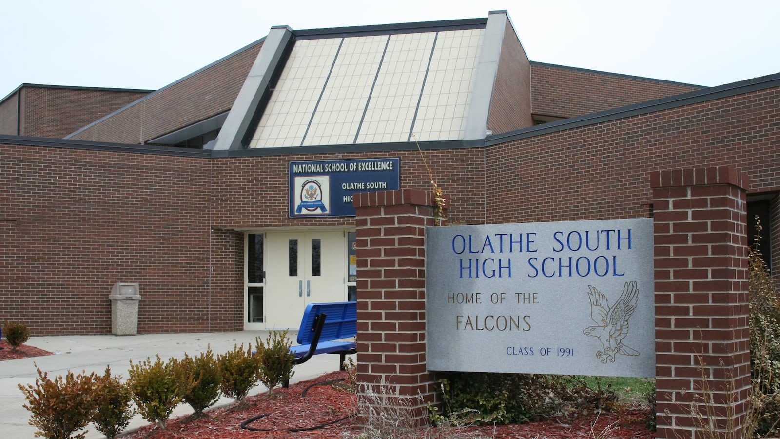 A photo of the front door of Olathe South High School in Olathe, Kansas.