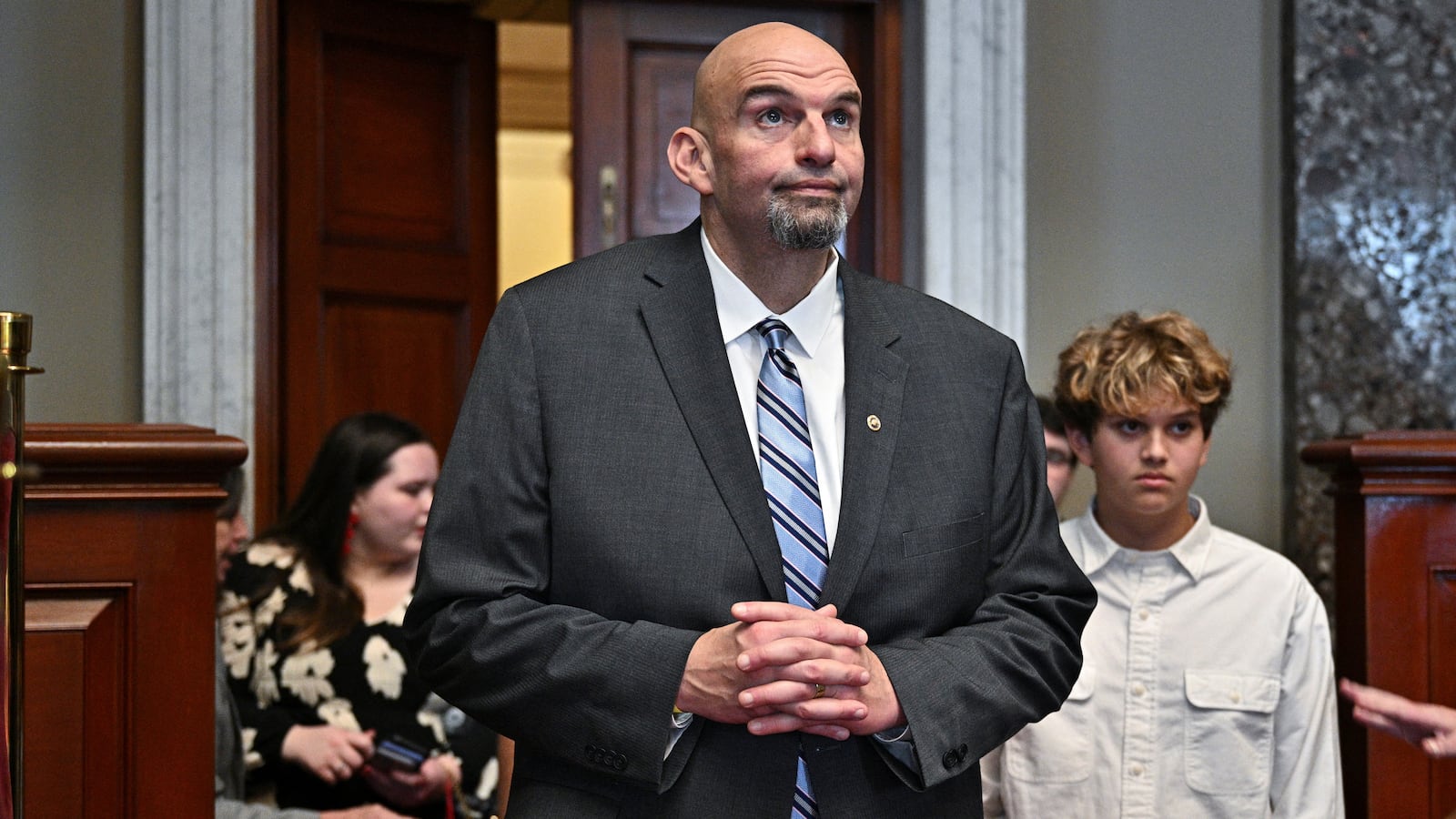 U.S. Senator John Fetterman (D-PA) waits with family members to be ceremonially sworn into office by Vice President Kamala Harris