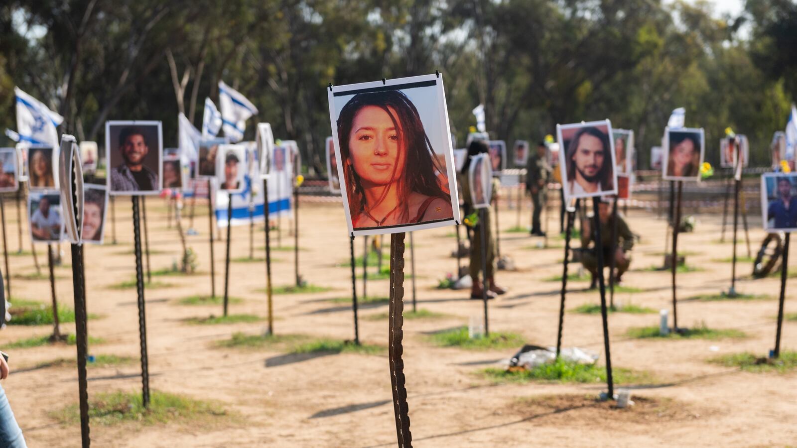Photos of people killed or kidnapped during the Hamas attack on the Super Nova festival on October 7th are displayed in a temporary memorial site on January 04, 2024 in Re'im, Israel.