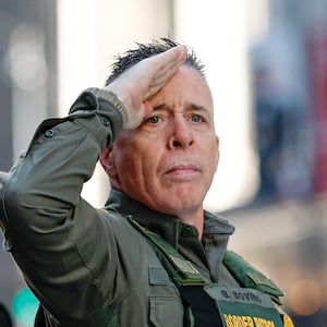 US Customs and Border Patrol Commander Gregory Bovino (C) leaves federal court at Dirksen Federal Building after his hearing in Chicago, Illinois, on October 28, 2025. Bovino was ordered to appear in federal court for violating a temporary restraining order issued by District Judge Sara Ellis that orders immigration enforcement agents to limit use of tear gas and other crowd-suppression items except when there is an imminent threat. (Photo by KAMIL KRZACZYNSKI / AFP) (Photo by KAMIL KRZACZYNSKI/AFP via Getty Images)