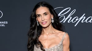 Demi Moore attends the Chopard Trophy photocall at the 79th annual Cannes Film Festival at Carlton Beach on May 15, 2026, in Cannes, France.