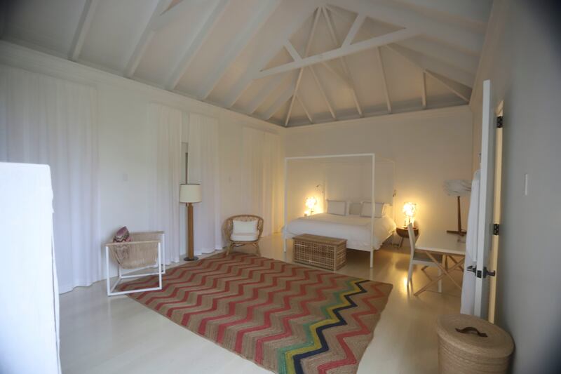 A chevron pattern rug sits in another bedroom in Jeffrey Epstein’s Caribbean estate.